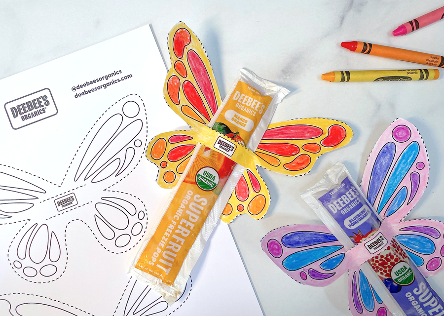 spring crafts for kids showing colored butterfly wings for freezer pops with crayons